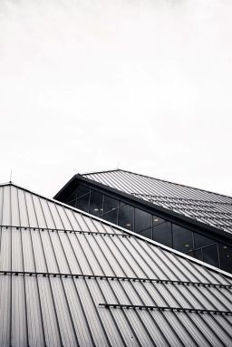 Large commercial building with professional roofing
